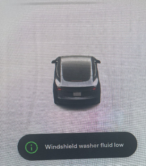 tesla rental no windshield washer fluid